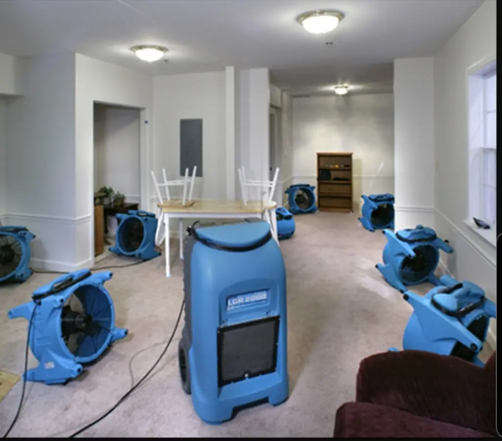 Air movers and dehumidifier setup for Water Extraction & Removal in Lysander